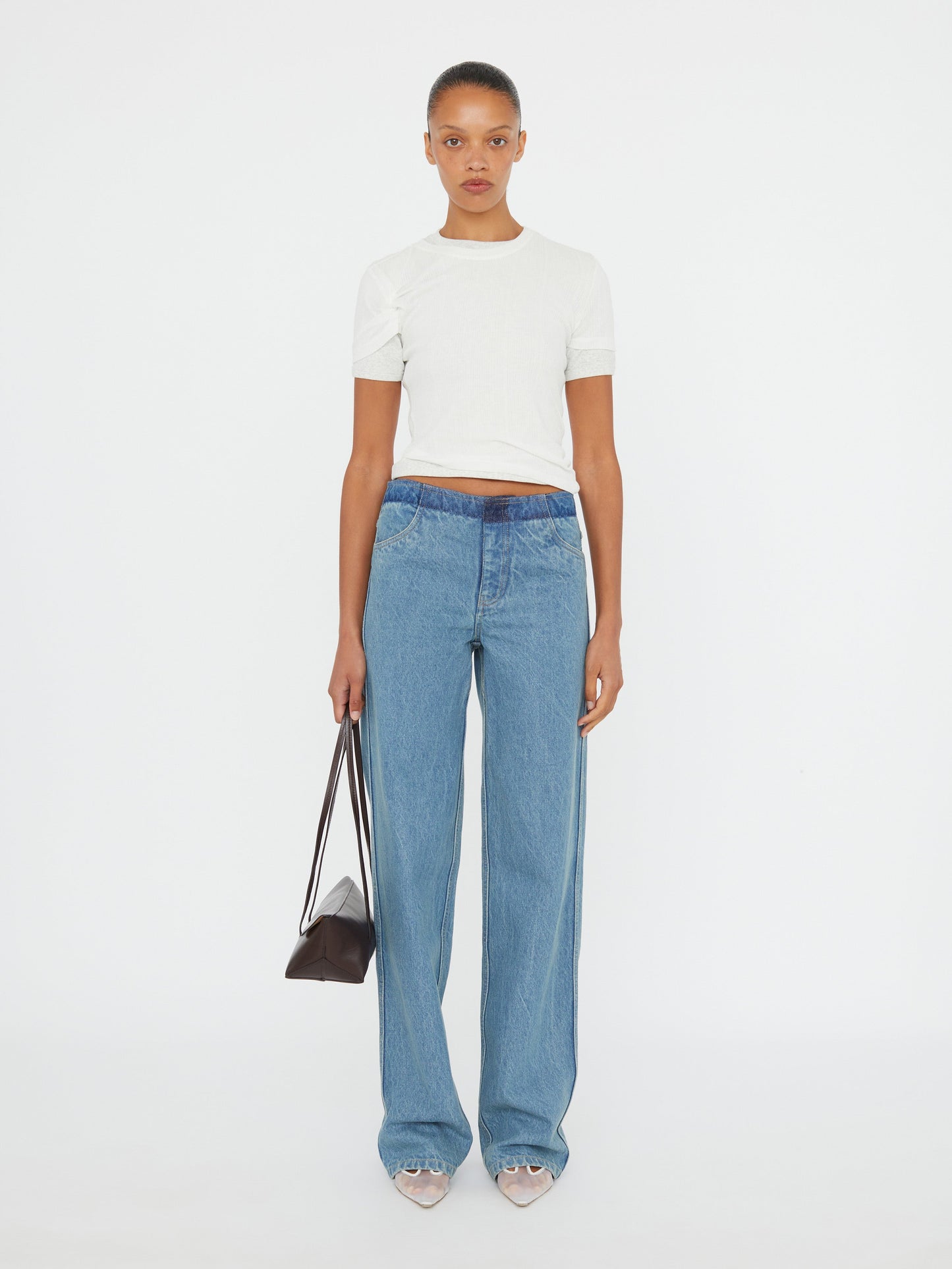 Image of a model wearing Denim. Productname: Christopher Esber Deconstruct Denim Jean in Indigo colour by brand - Christopher Esber
