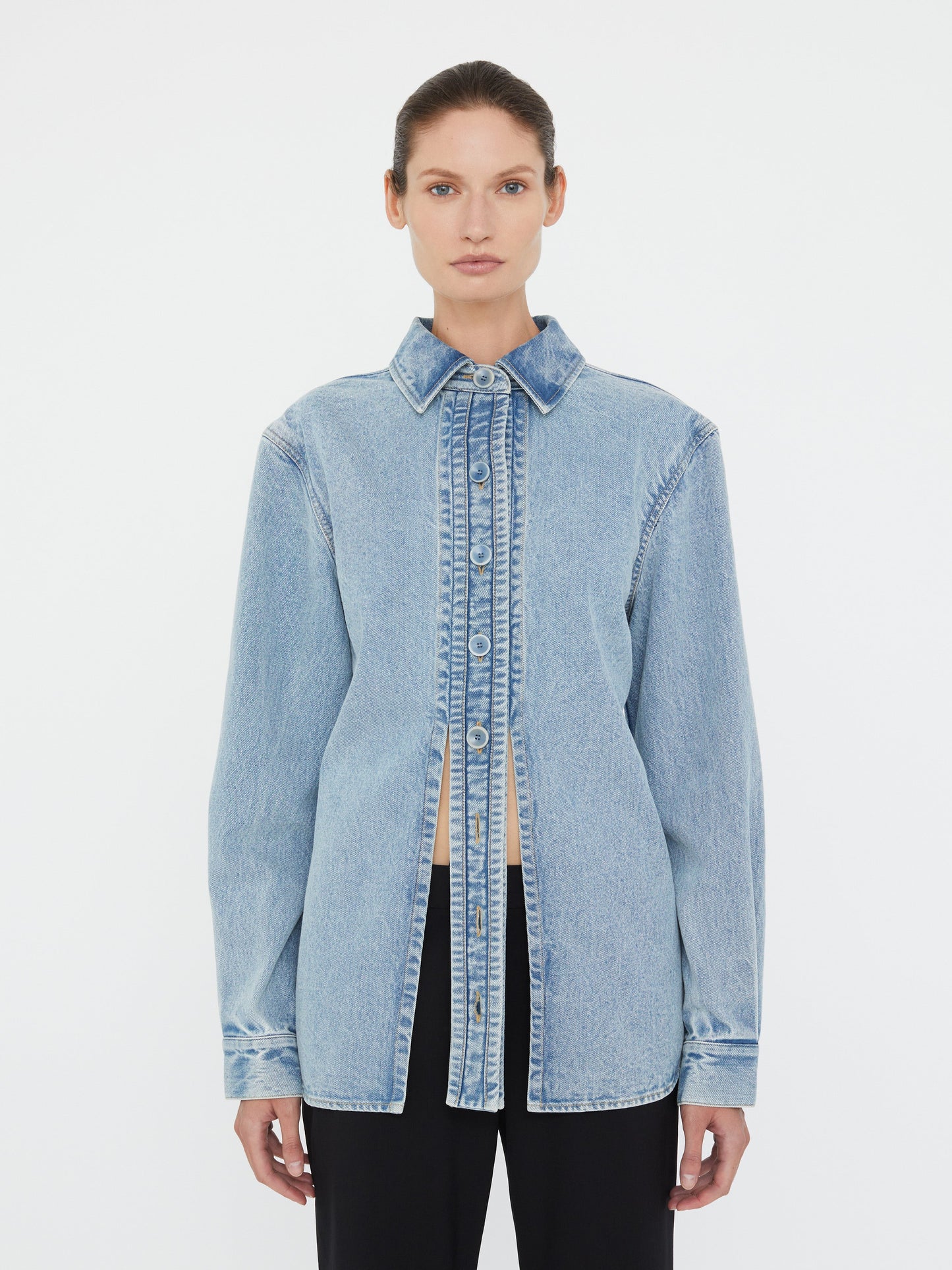 Image of a model wearing Denim. Productname: Christopher Esber Denim Floating Tab Shirt in Shirt colour by brand - Christopher Esber