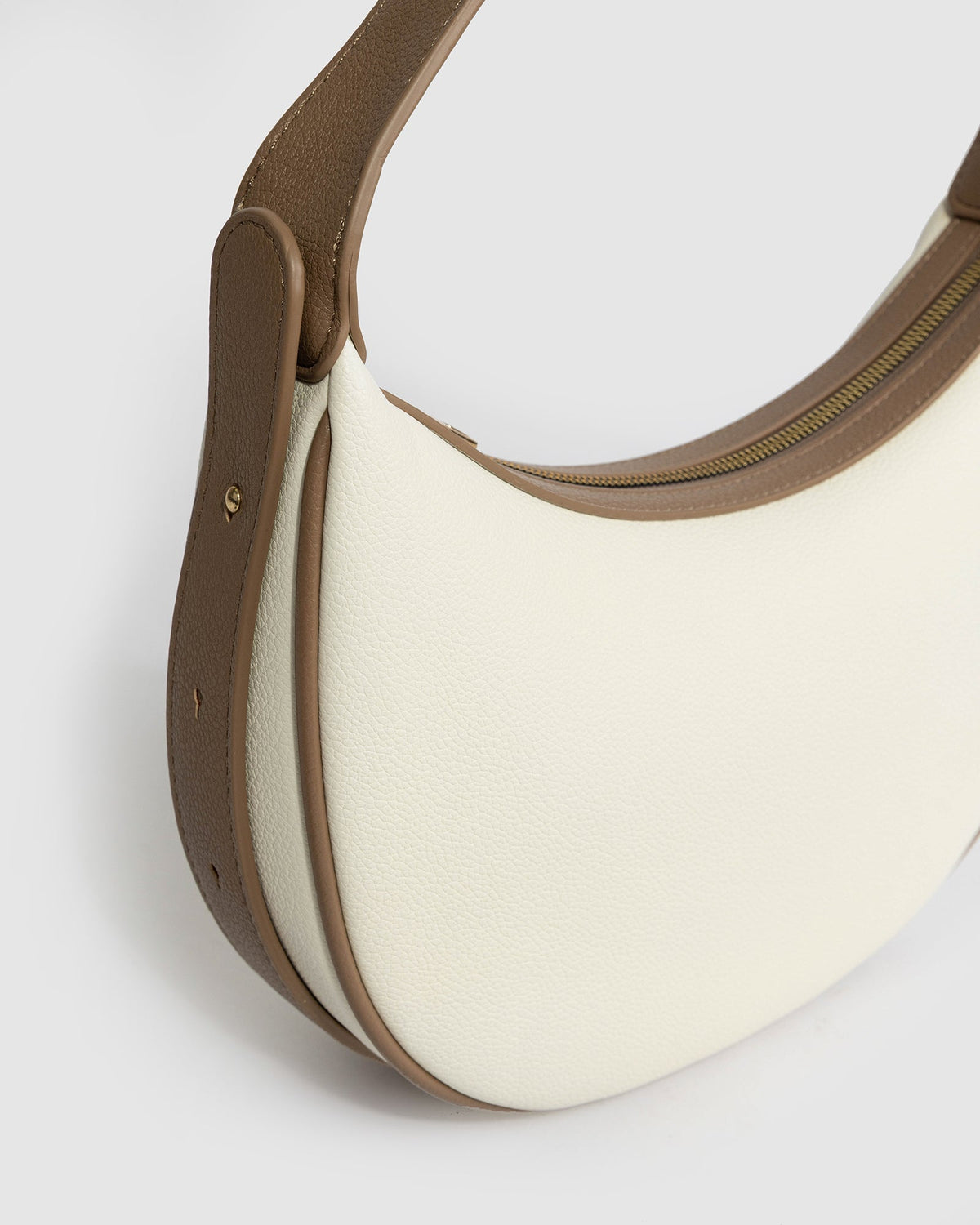 Image of Bags. Product name - White Carla Crescent Top Handle Bag in White colour by brand - Colette by Colette Hayman