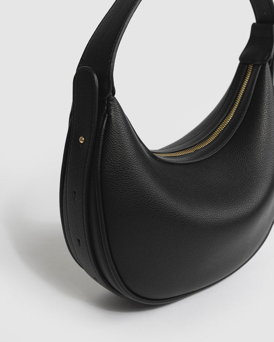 Image of Bags. Product name - Black Carla Crescent Top Handle Bag in Black colour by brand - Colette by Colette Hayman