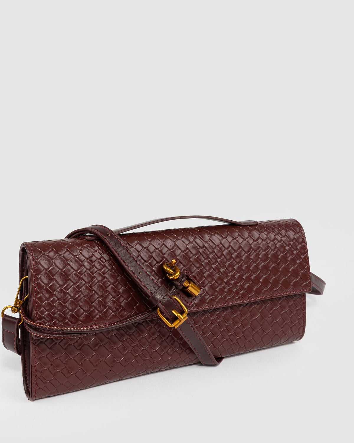 Image of Clutch Bags. Product name - Red Gigi Top Handle Clutch in Red colour by brand - Colette by Colette Hayman