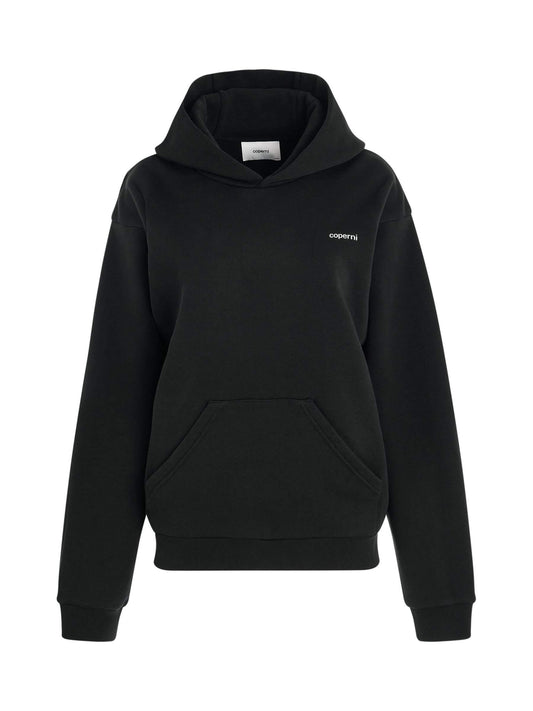 Image of a model wearing Outerwear. Productname: COPERNI Horn Hoodie in BLACK colour by brand - COPERNI