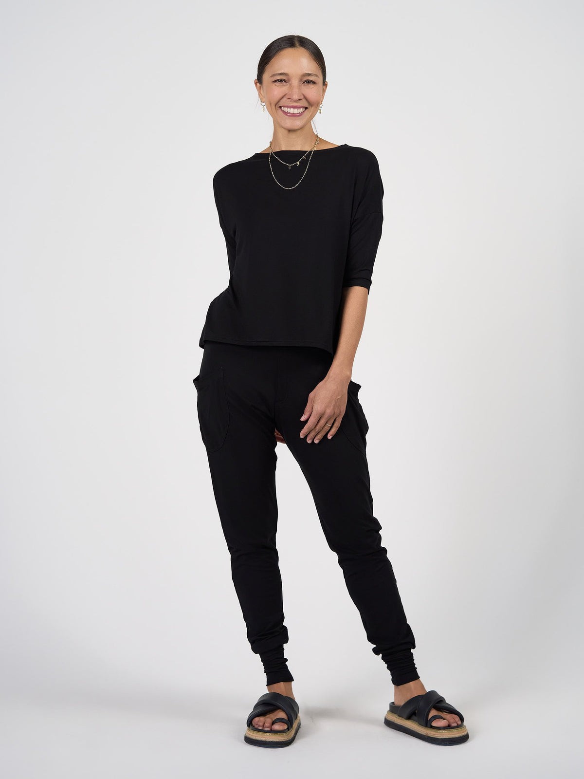 Image of a model wearing Tops. Product name - The Tee & Top Set in Default Title colour by brand - Lou Lou