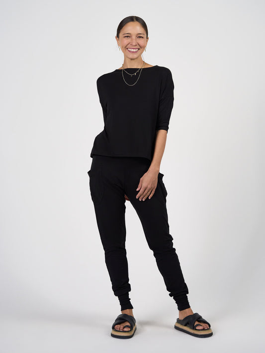 Image of a model wearing Tops. Product name - The Tee & Top Set in Default Title colour by brand - Lou Lou