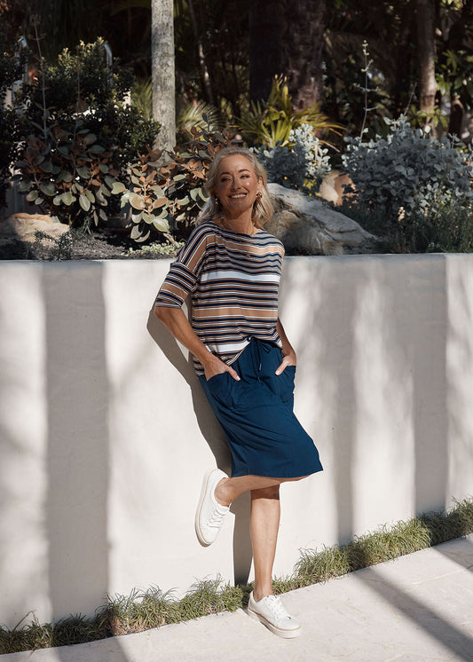 Image of a model wearing Tops. Product name - Camila 3/4 Sleeve Bamboo Top Stripe in Stripe colour by brand - Lou Lou
