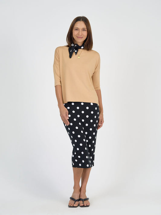 Image of a model wearing Tops. Product name - Camila 3/4 Sleeve Bamboo Top Tan in Tan colour by brand - Lou Lou