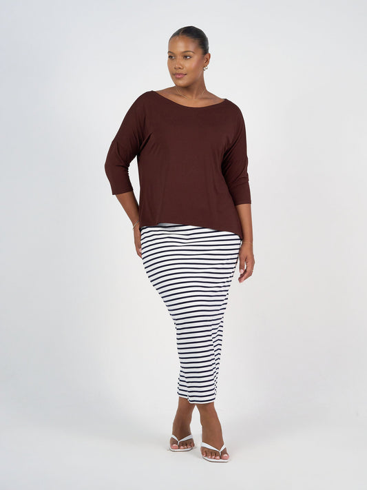 Image of a model wearing Tops. Product name - Camila 3/4 Sleeve Bamboo Top Burgundy in Burgundy colour by brand - Lou Lou