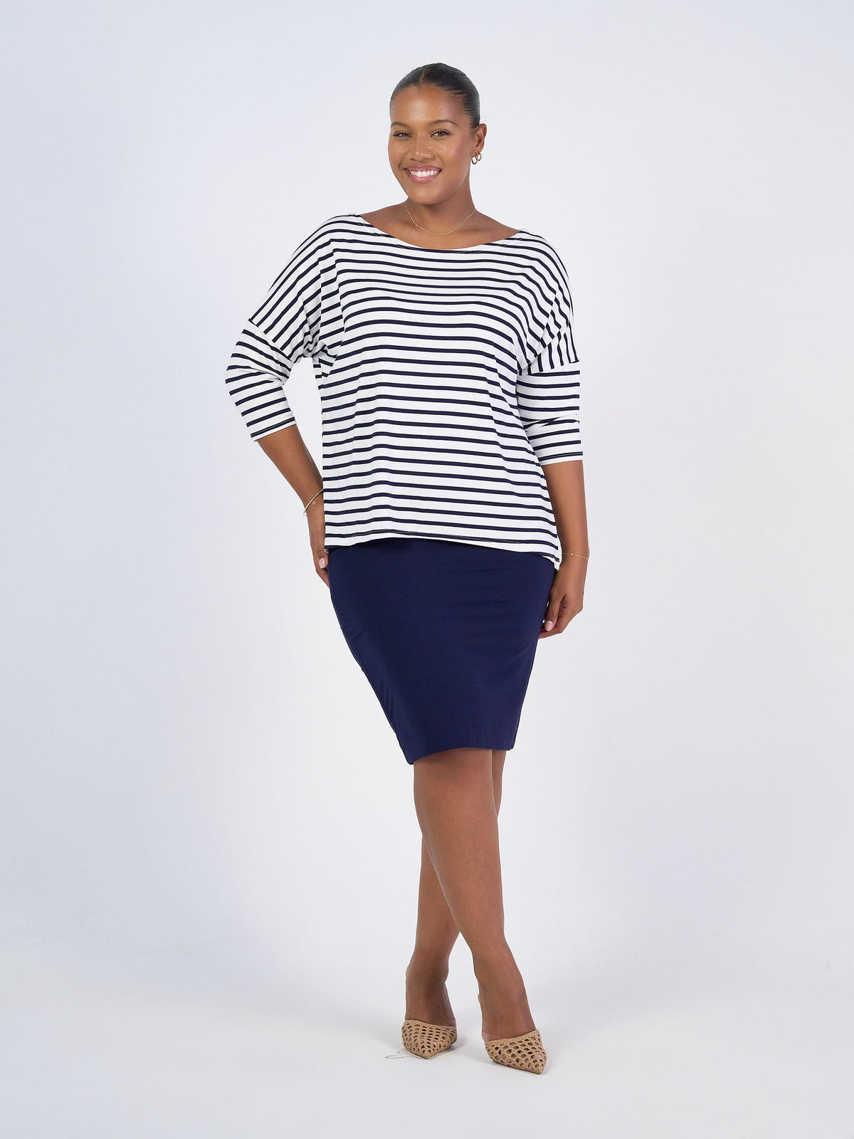 Image of a model wearing Tops. Product name - Camila 3/4 Sleeve Bamboo Top Navy & White Stripe in Navy & White Stripe colour by brand - Lou Lou
