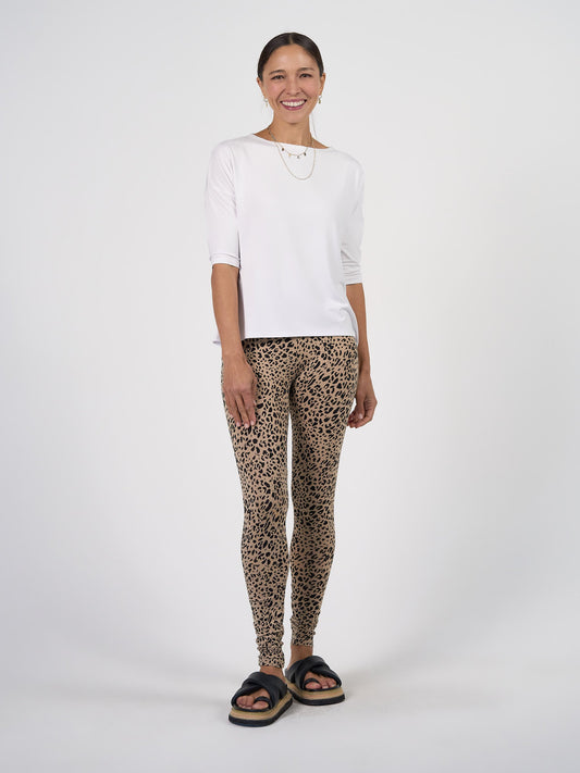 Image of a model wearing Tops. Product name - Camila 3/4 Sleeve Bamboo Top White in White colour by brand - Lou Lou