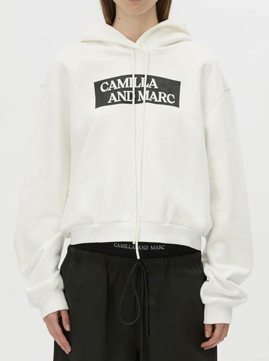 Image of a model wearing Tops. Product name - CAMILLA AND MARC CARMONT GRAPHIC HOODIE in Soft White colour by brand - Camilla And Marc