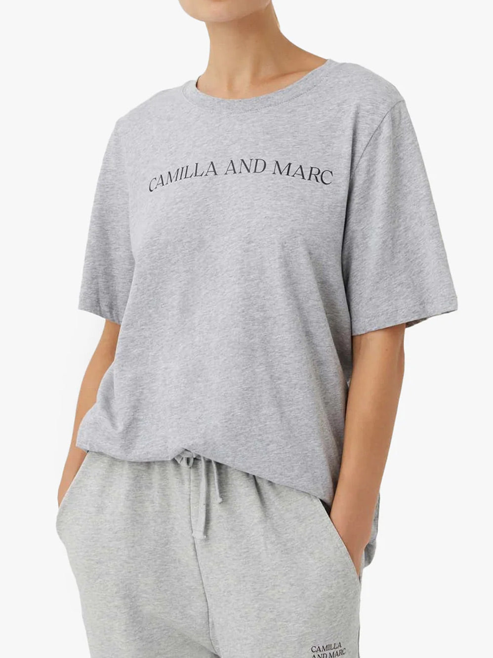 Image of a model wearing Tops. Productname: CAMILLA AND MARC ASHER TEE in Black Stone colour by brand - Camilla And Marc