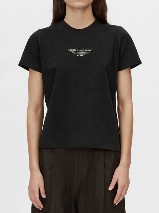 Image of a model wearing Tops. Productname: CAMILLA AND MARC JANICE NEAT FIT TEE in Black colour by brand - Camilla And Marc