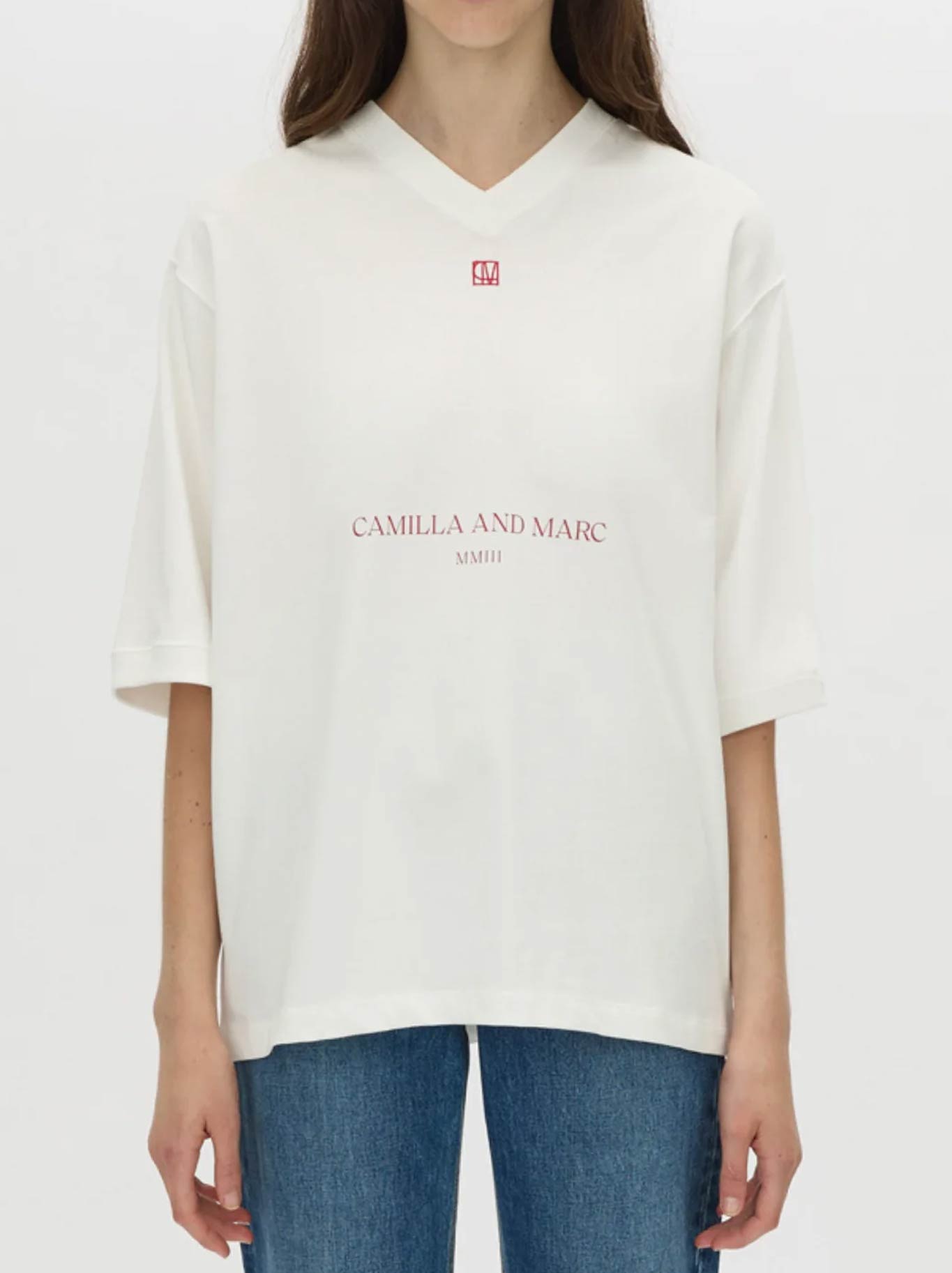 Image of a model wearing Tops. Product name - CAMILLA AND MARC LARISSA LOGO TEE in White colour by brand - Camilla And Marc
