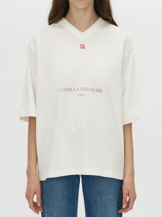Image of a model wearing Tops. Product name - CAMILLA AND MARC LARISSA LOGO TEE in White colour by brand - Camilla And Marc