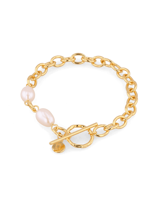 Image of Bracelets. Product name - Cannes Gold Pearl T-Bar Bracelet in colour by brand - LAVANA