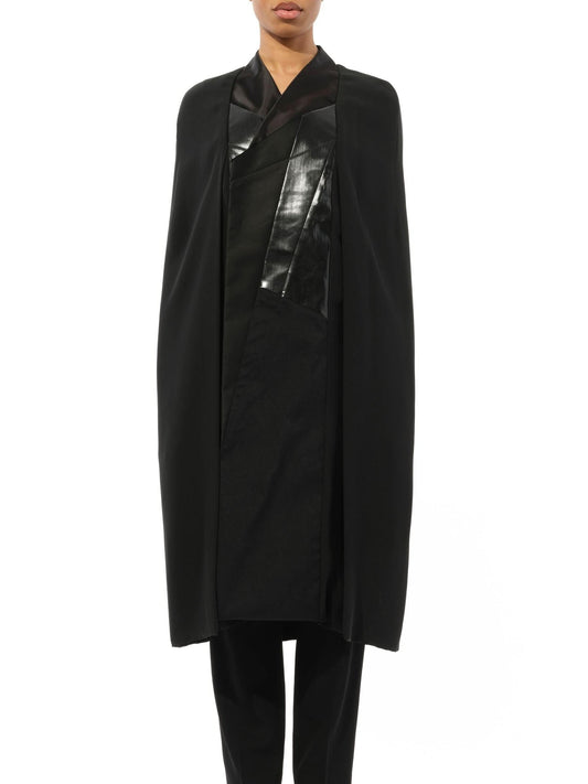 Image of a model wearing Outerwear. Productname: RICK OWENS Cape Coat in Black colour by brand - RICK OWENS