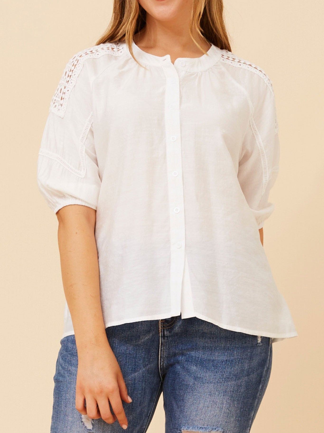 Image of a model wearing Tops. Productname: CAROLINE K MORGAN LACE DETAIL TOP in White colour by brand - Caroline K Morgan Pty Ltd
