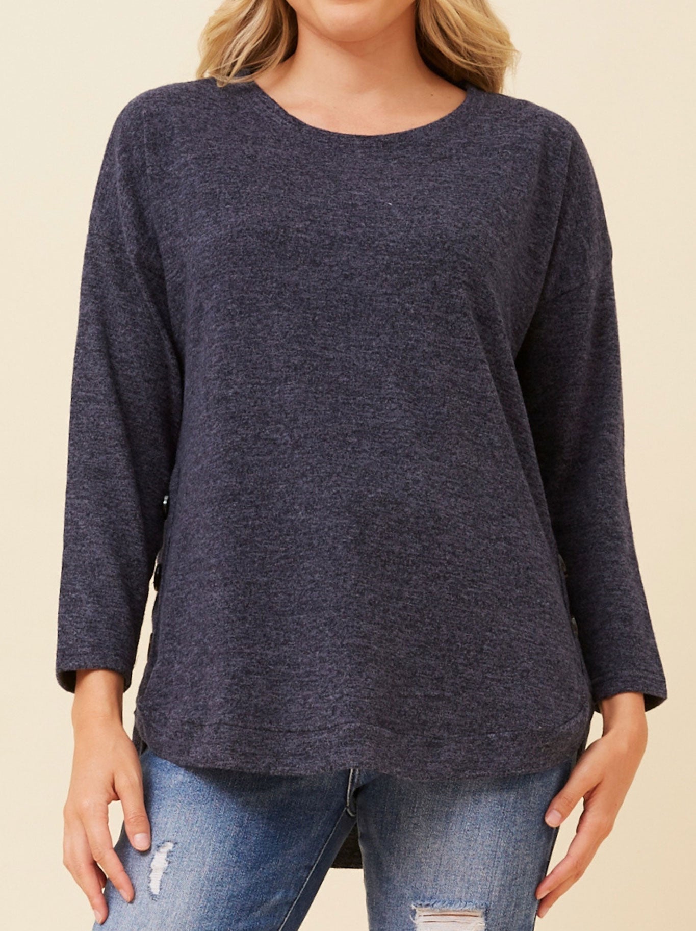 Image of a model wearing Tops. Productname: CAROLINE K MORGAN BUTTON DETAIL CURVED HEM TOP in Navy A colour by brand - Caroline K Morgan Pty Ltd