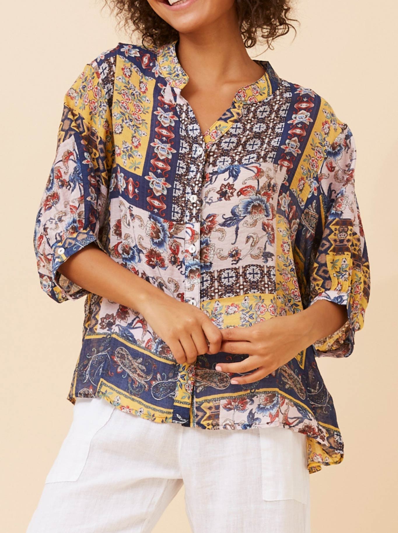 Image of Shirts. Productname: CAROLINE K MORGAN FLORAL SHIRT WITH BACK BUTTONS in Navy Floral colour by brand - Caroline K Morgan Pty Ltd