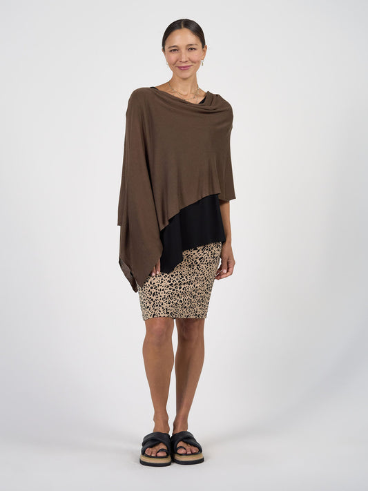 Image of a model wearing Outerwear. Product name - Carrie Cashmere & Bamboo Knit Poncho Chocolate in Chocolate colour by brand - Lou Lou