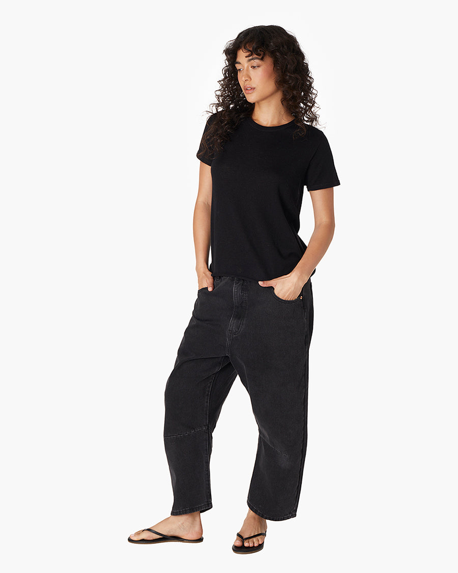 Image of a model wearing Outerwear. Productname: Cashmere Classic Tee Black in Black colour by brand - TKEES