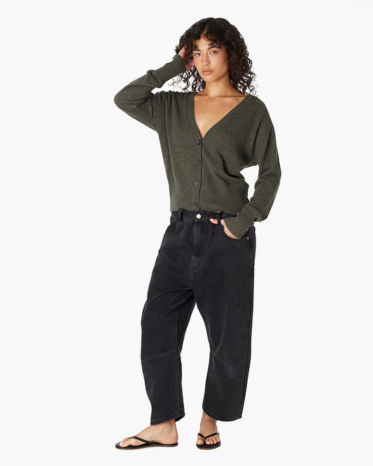 Image of a model wearing Outerwear. Productname: Cashmere V Neck Cardigan Moss in Moss colour by brand - TKEES