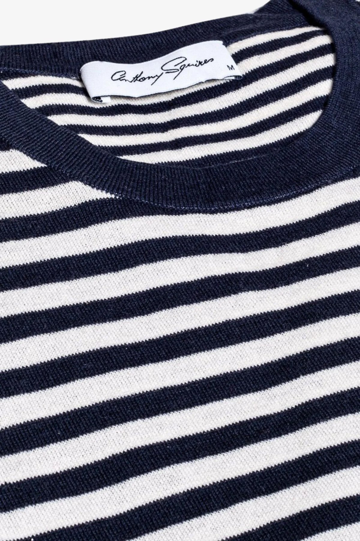 Image of a model wearing Tops. Product name - Chance Navy & White Long Sleeve Knitted T-shirt in White colour by brand - Anthony Squires