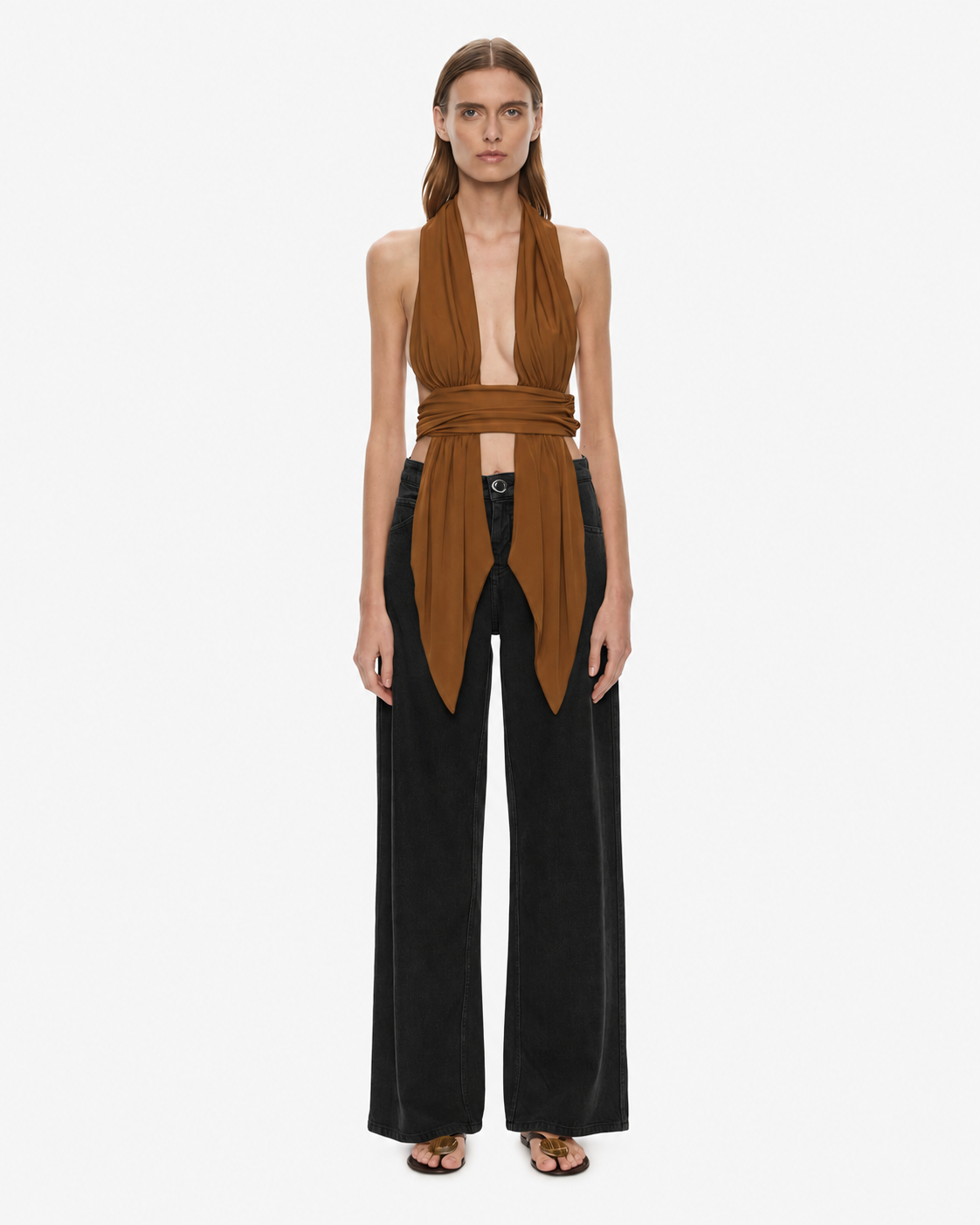 Image of a model wearing Pants. Product name - Relaxed Denim Quartz Jean in Black colour by brand - CHRISTOPHER ESBER