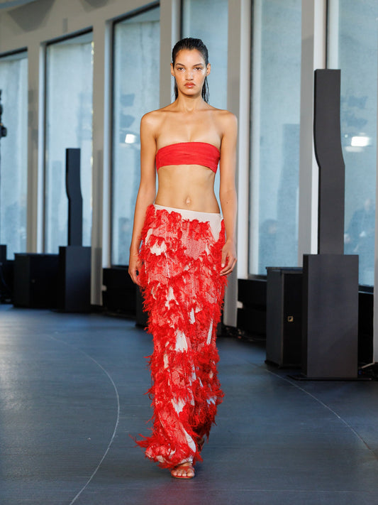 Image of a model wearing Skirts. Productname: Hand Embroidered Tapestry Silk Skirt in Skirt colour by brand - Christopher Esber