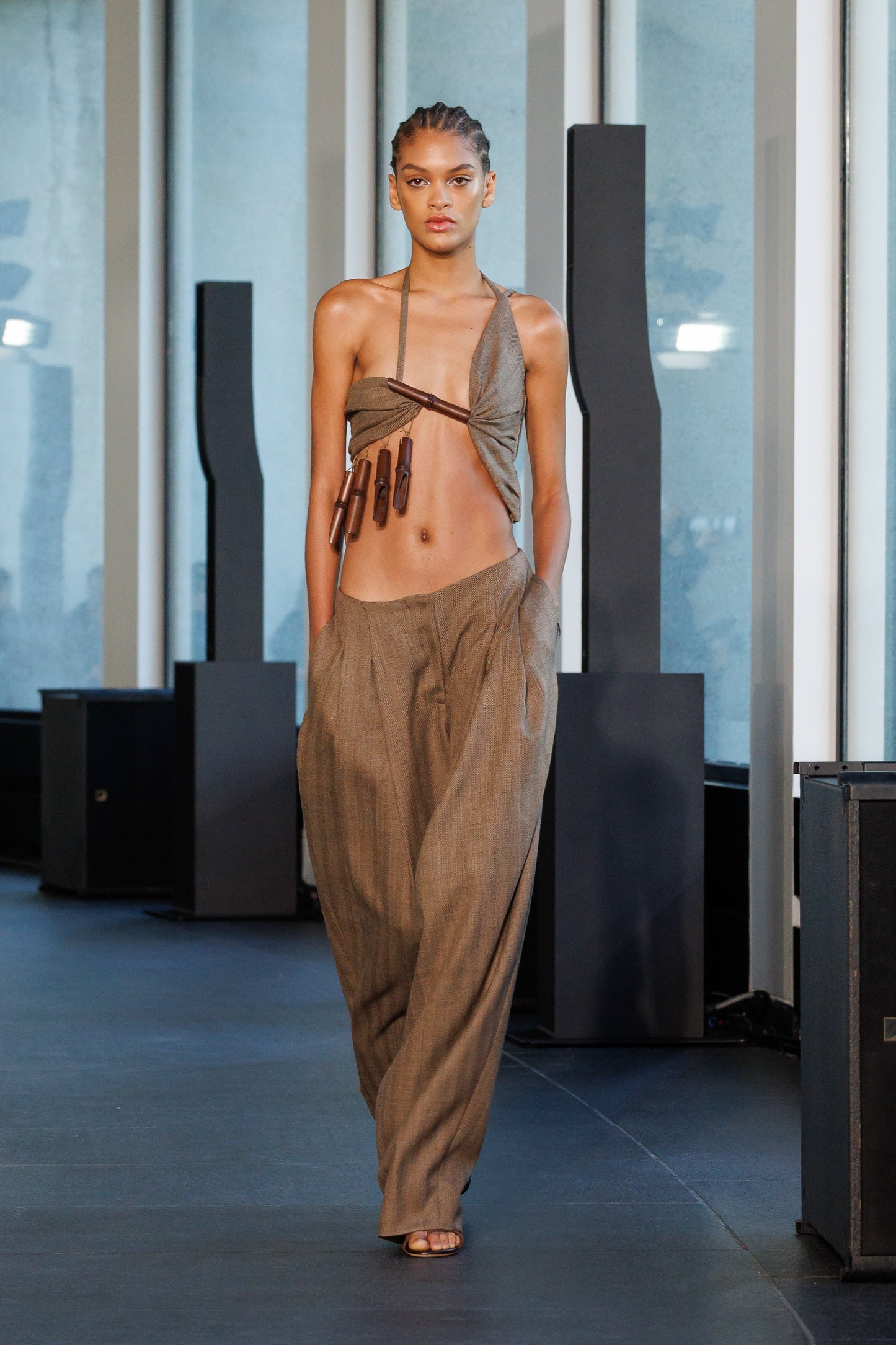 Image of a model wearing Tops. Product name - Chime Herringbone Top in Brown colour by brand - CHRISTOPHER ESBER