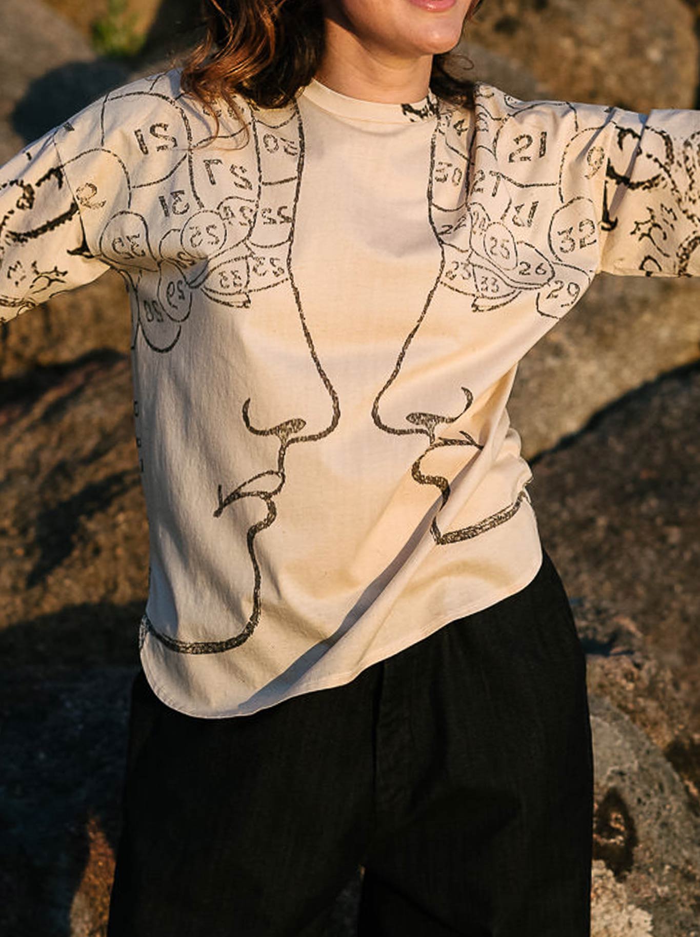 Image of a model wearing Tops. Productname: Circular By M.A Dainty Tippy Top in Phrenology colour by brand - M.A Dainty