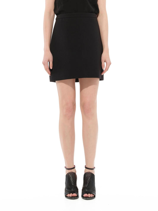 Image of a model wearing Shorts. Productname: GIVENCHY Classic Short Skirt in Black colour by brand - GIVENCHY