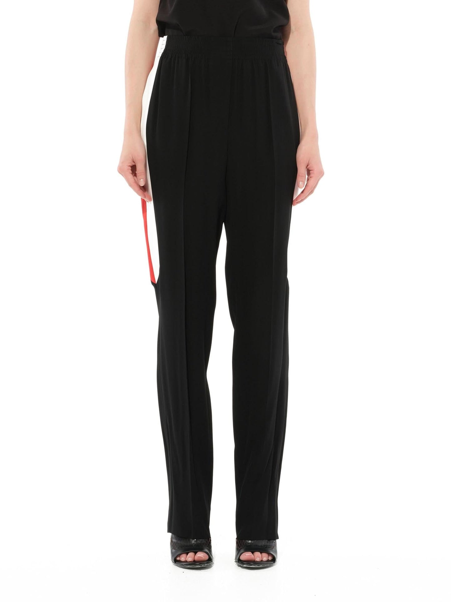 Image of a model wearing Pants. Productname: GIVENCHY Crepe Satin Fit Pants in Black colour by brand - GIVENCHY