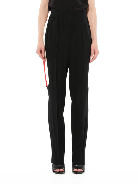 Image of a model wearing Pants. Productname: GIVENCHY Crepe Satin Fit Pants in Black colour by brand - GIVENCHY