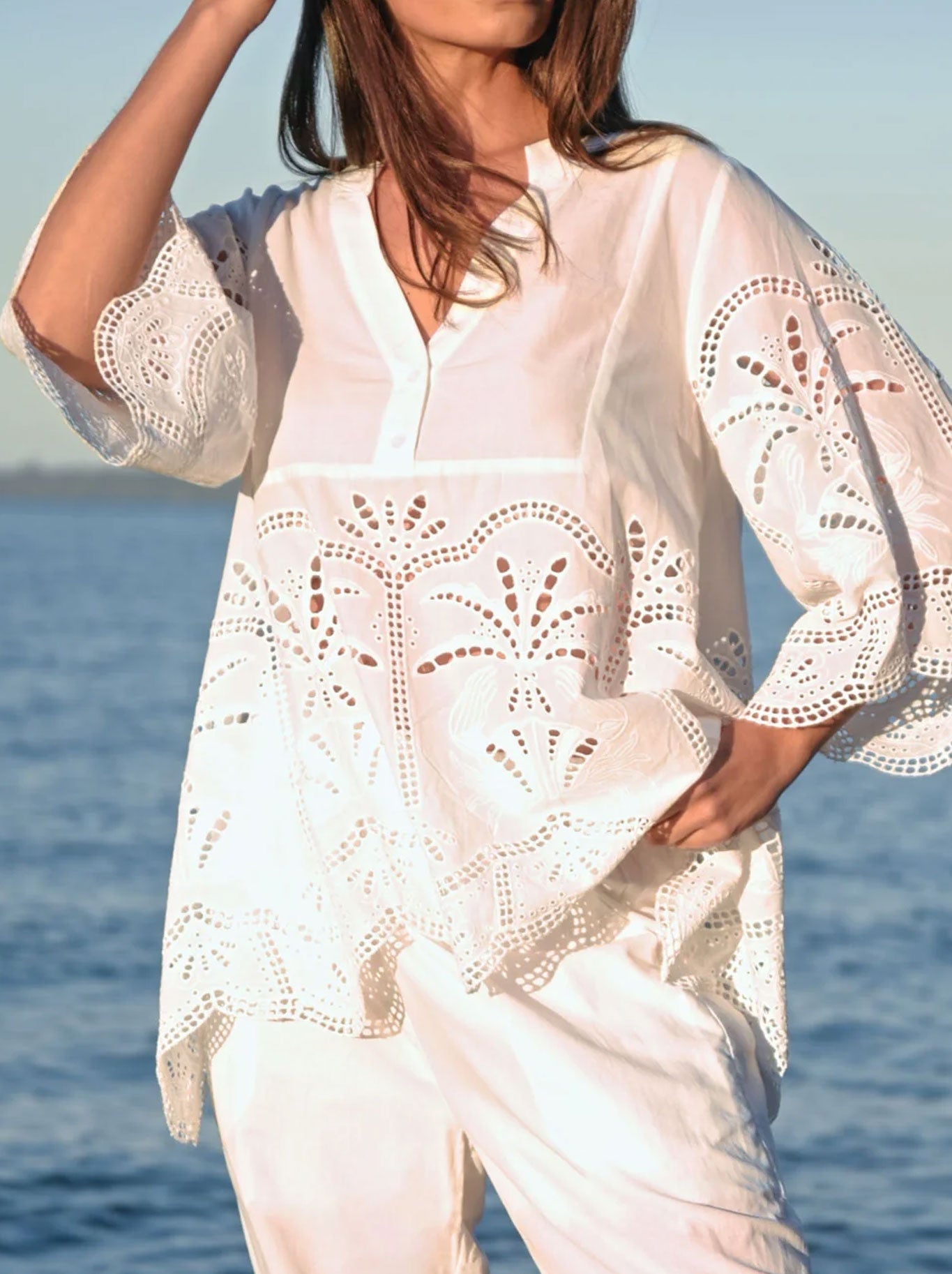 Image of a model wearing Tops. Productname: Curate By Trelise Cooper Border Control Top in White colour by brand - Curate(Trelise Cooper)