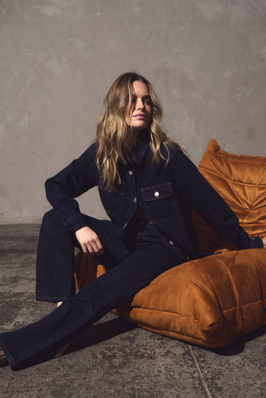 Image of a model wearing Pants. Product name - Kalani Straight Leg Jean Rinse Wash in Rinse Wash colour by brand - Sass Clothing