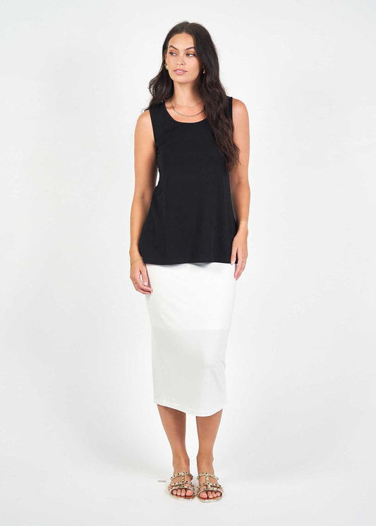 Image of a model wearing Tops. Product name - Alicia Reversible Bamboo Singlet Top in Black colour by brand - Lou Lou