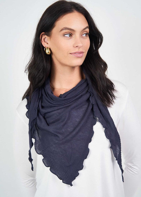 Image of a model wearing Outerwear. Product name - Sassoon Cashmere/Bamboo Scarf Navy in Navy colour by brand - Lou Lou