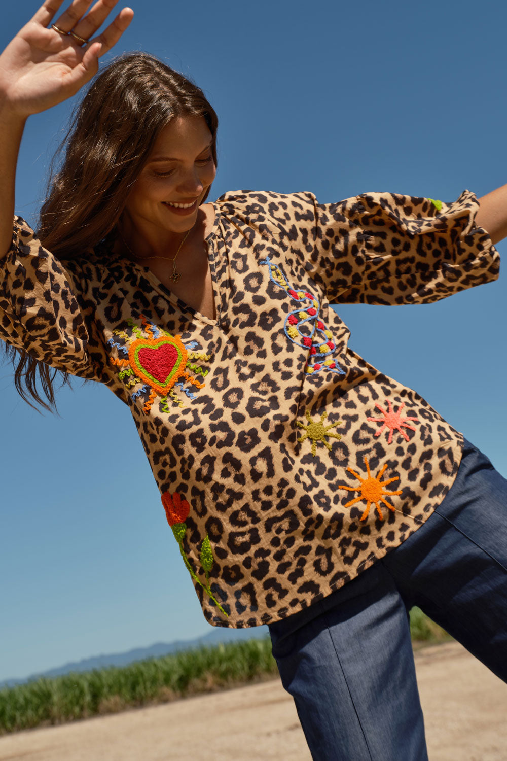 Image of a model wearing Tops. Product name - LulaLife Azure Top Leopard in Leopard colour by brand - LulaLife
