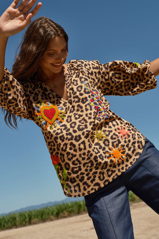 Image of a model wearing Tops. Product name - LulaLife Azure Top Leopard in Leopard colour by brand - LulaLife