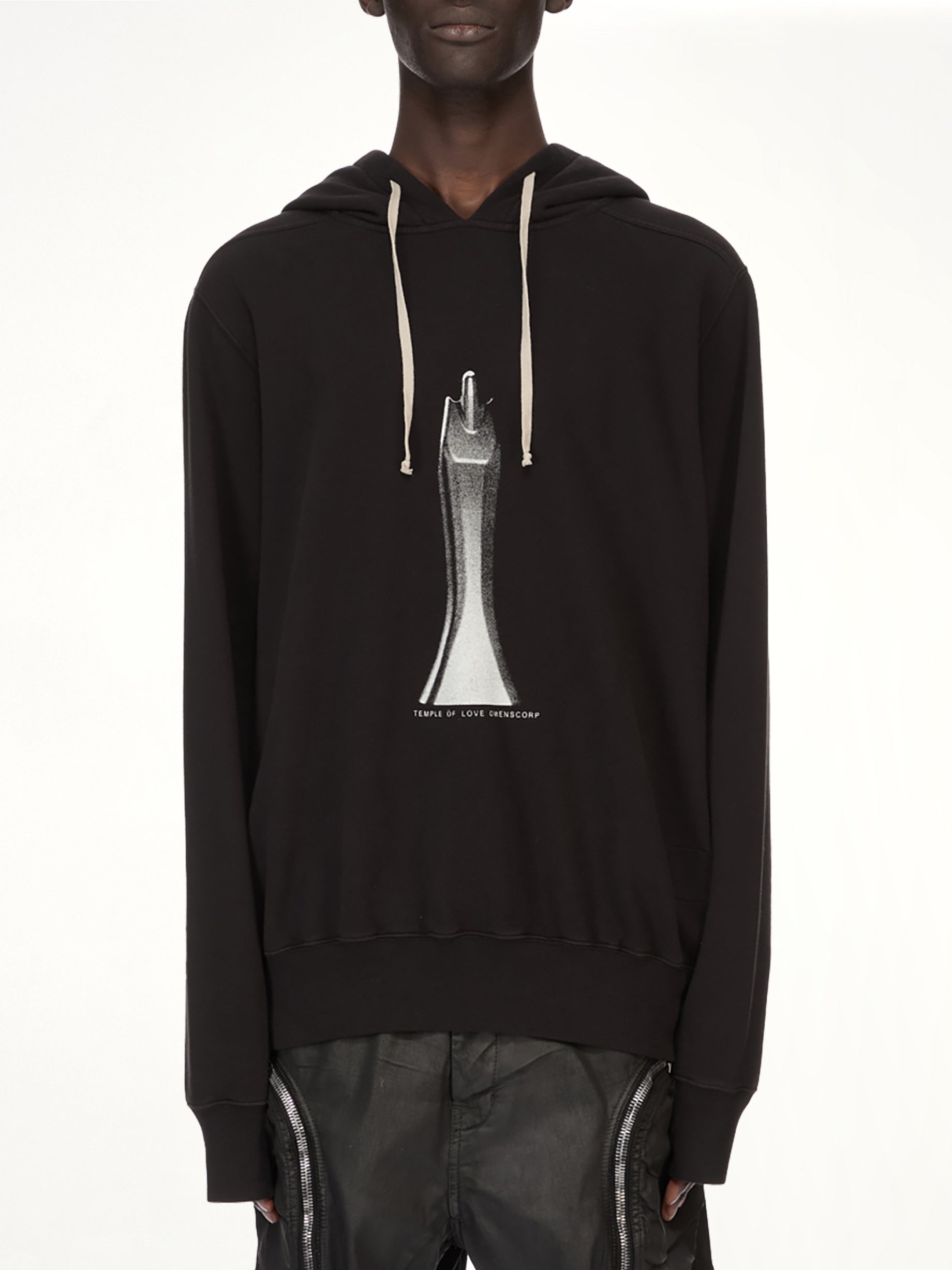 Image of a model wearing Outerwear. Product name - Statue Oversized Hoodie in Black colour by brand - RICK OWENS DRKSHDW