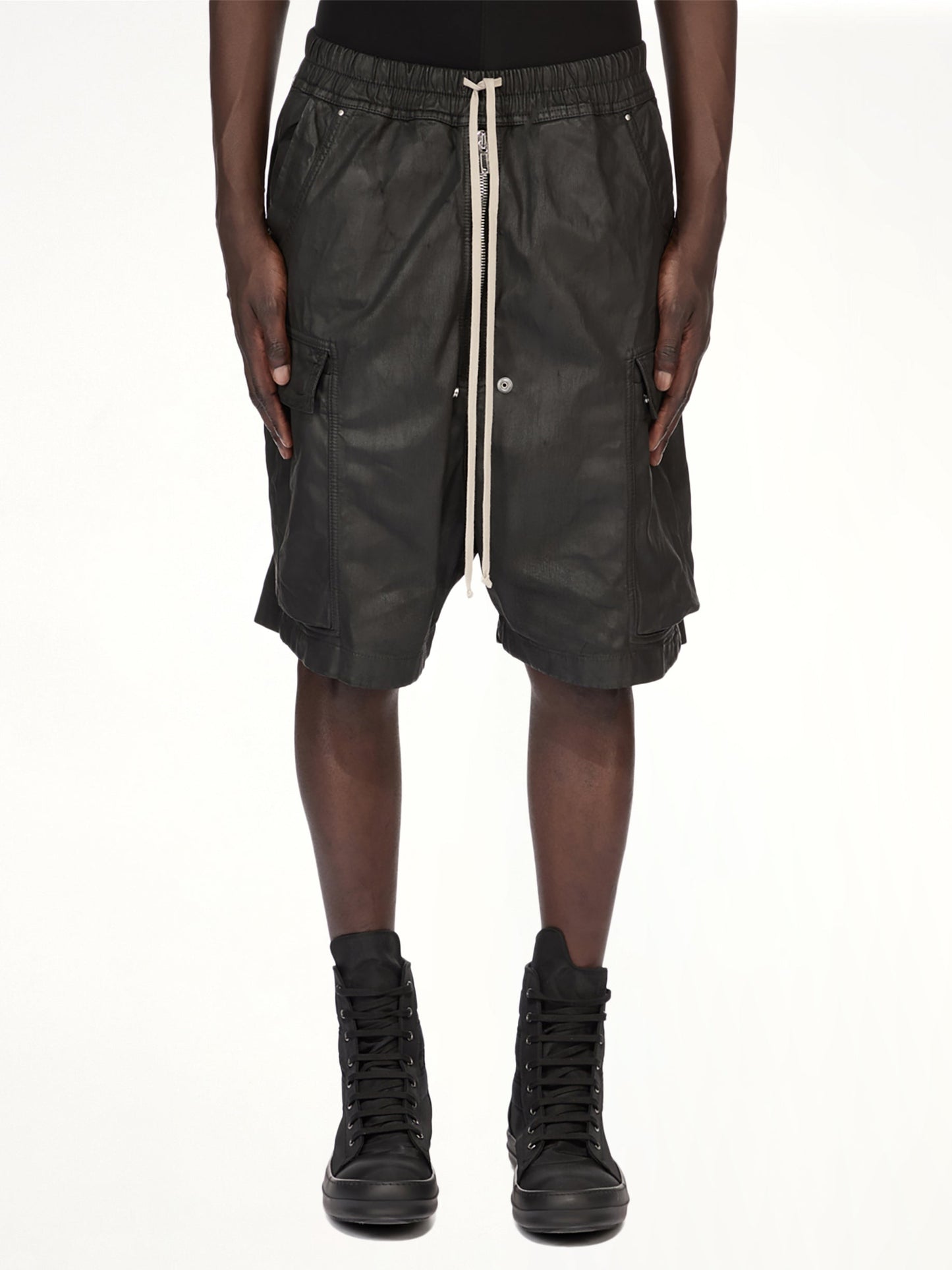 Image of a model wearing Shorts. Product name - Denim Cargobela Shorts in Black colour by brand - RICK OWENS DRKSHDW