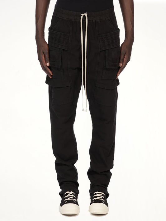 Image of a model wearing Pants. Product name - Creatch Cargo Drawstring in Black colour by brand - RICK OWENS DRKSHDW
