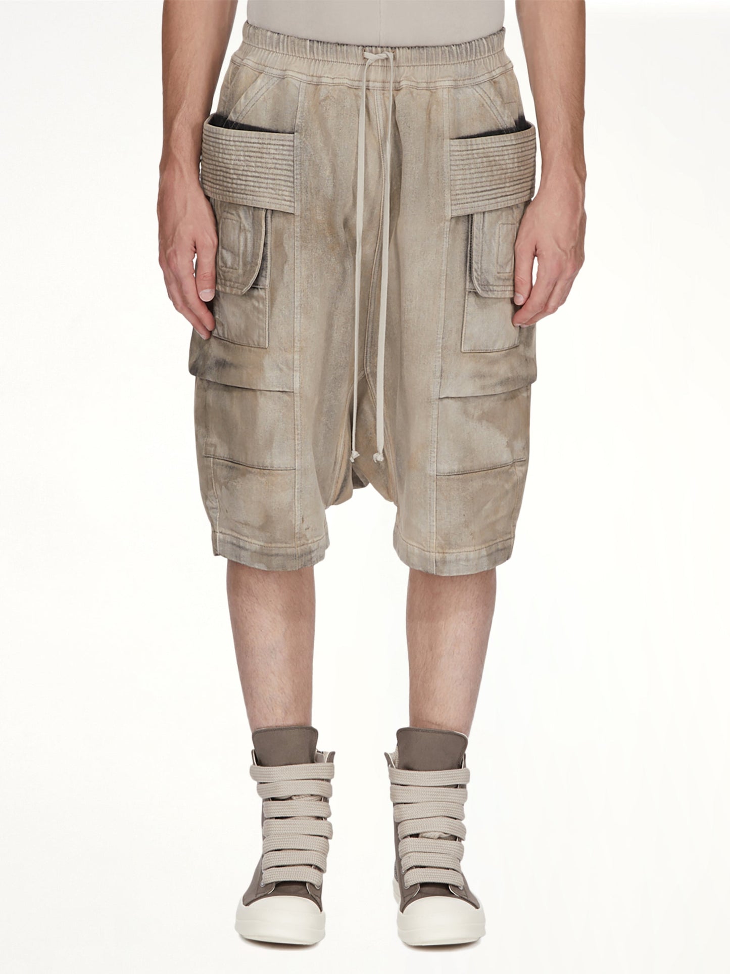 Image of a model wearing Shorts. Product name - Creatch Cargo Pods in Brown colour by brand - RICK OWENS DRKSHDW