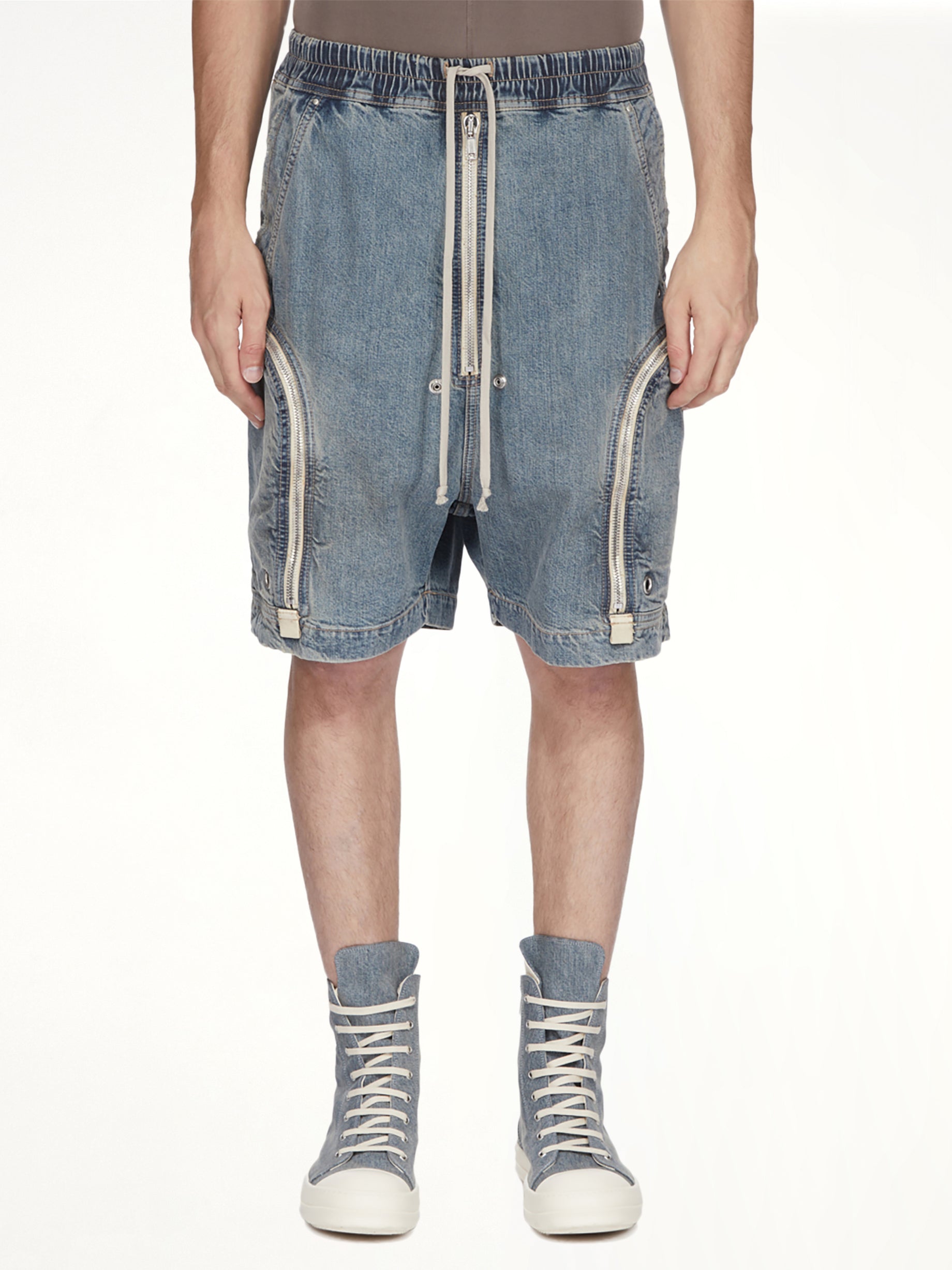Image of a model wearing Shorts. Product name - Bauhaus Pods in Blue colour by brand - RICK OWENS DRKSHDW