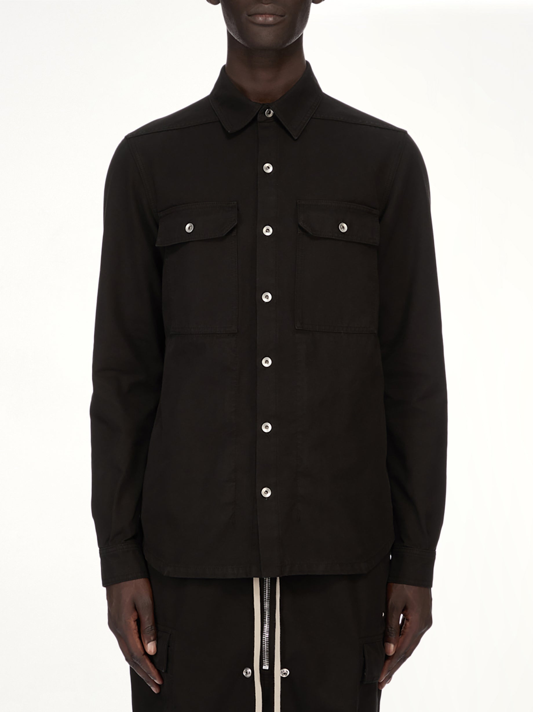 Image of a model wearing Tops. Product name - Woven Outershirt in Black colour by brand - RICK OWENS DRKSHDW
