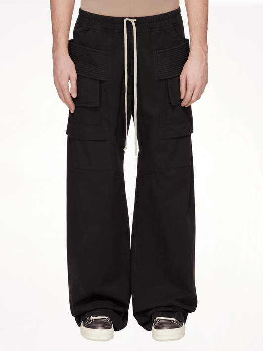 Image of a model wearing Pants. Productname: RICK OWENS DRKSHDW Creatch Wide Cargo Drawstring in Black colour by brand - RICK OWENS DRKSHDW