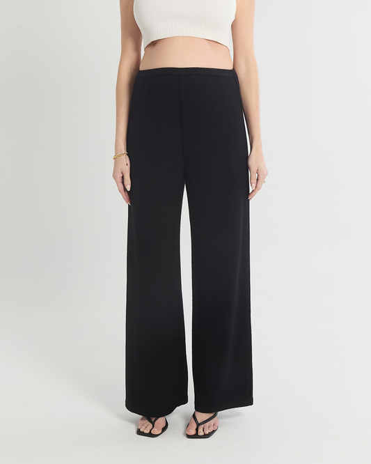 Image of a model wearing Pants. Product name - Danielle Knit Pants in colour by brand - Soon Maternity