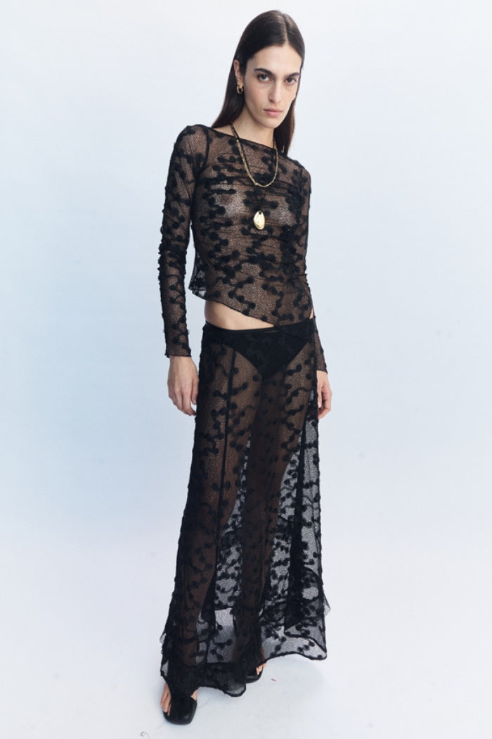 Image of a model wearing Skirts. Product name - Delphina Lace Skirt Black in Black colour by brand - Blanca Studio