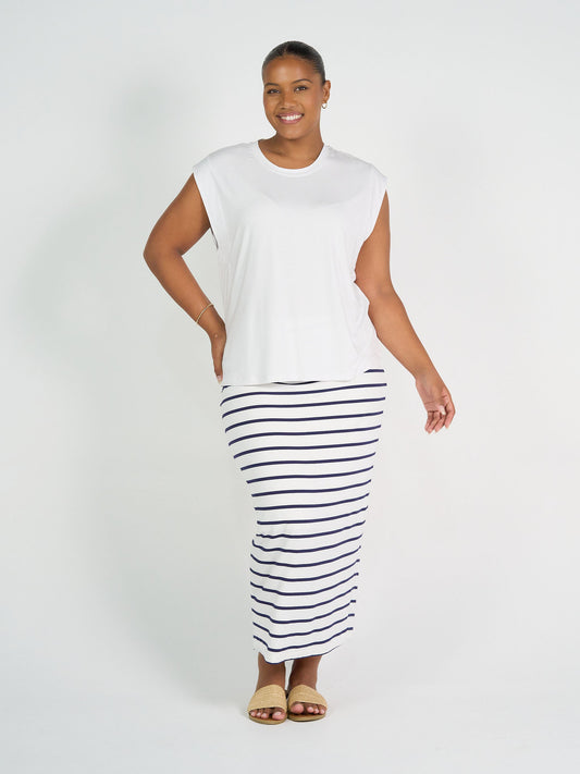 Image of a model wearing Tops. Product name - Donna Cap Sleeve Bamboo Tee White in White colour by brand - Lou Lou